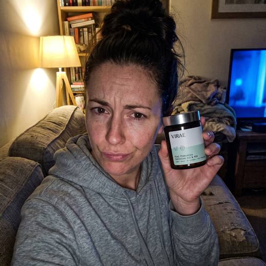 Customer holding the jar at home