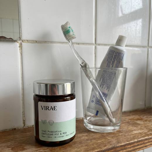 Jar on a wooden bathroom shelf