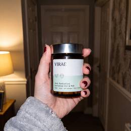 Jar held in a hallway at night